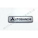 FREGIO LOGO POSTERIORE AUTOBIANCHI 112  "AUTOBIANCHI" (DIFETTO GRAFFIATA) G1